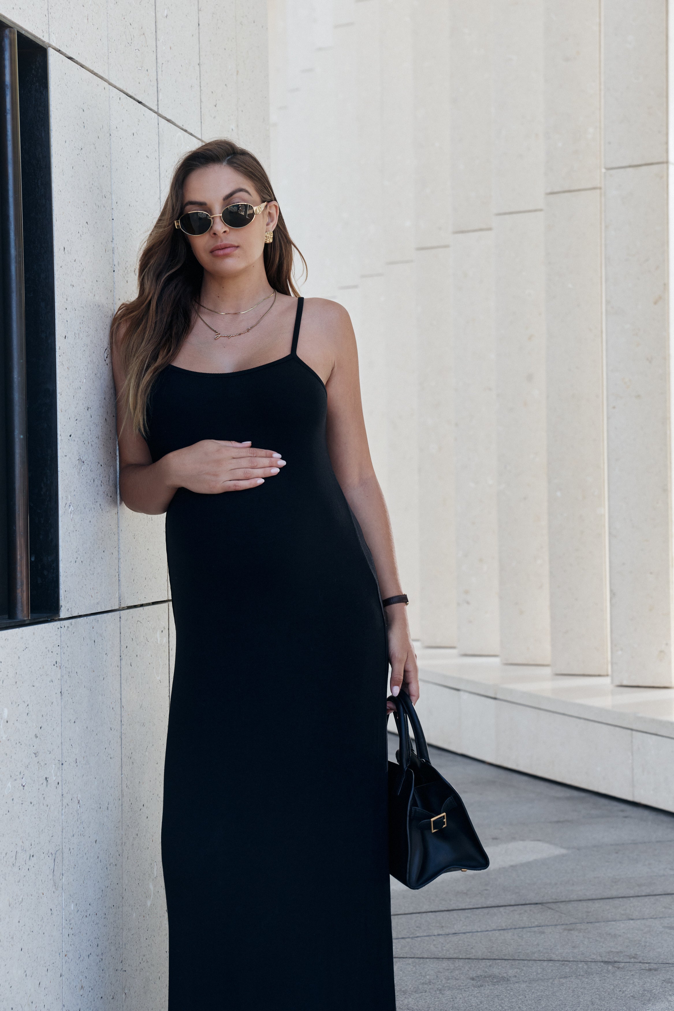 black mock neck sweater dress Angel Maternity Eliza Maternity Ribbed Tube Midi Dress In Black main image 1